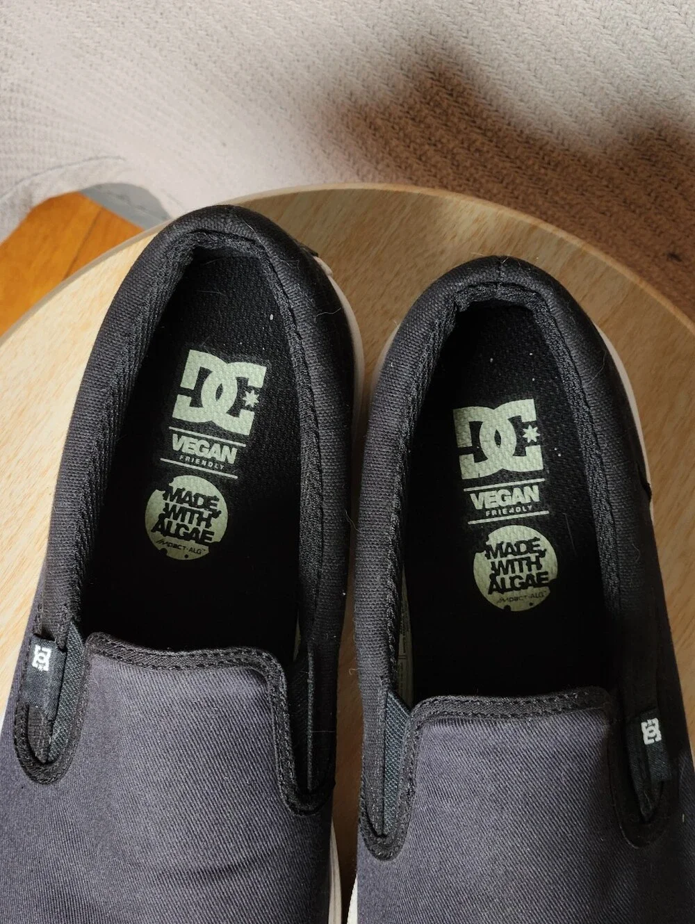 DC Trace Black Slip-On Canvas Vegan White Sole Skate Sneakers